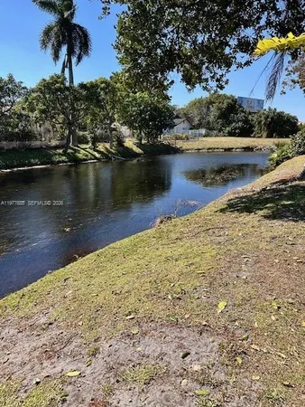 a view of a lake with houses