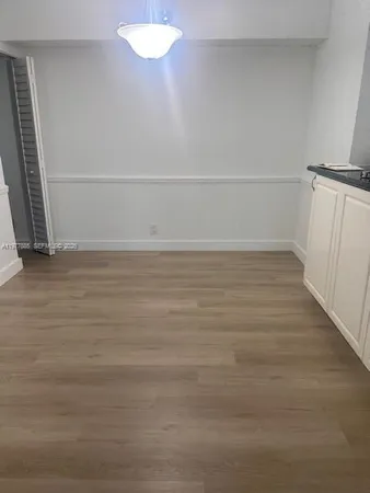 a view of a room with an empty space