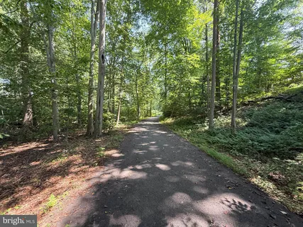 a view of a lake with a big yard