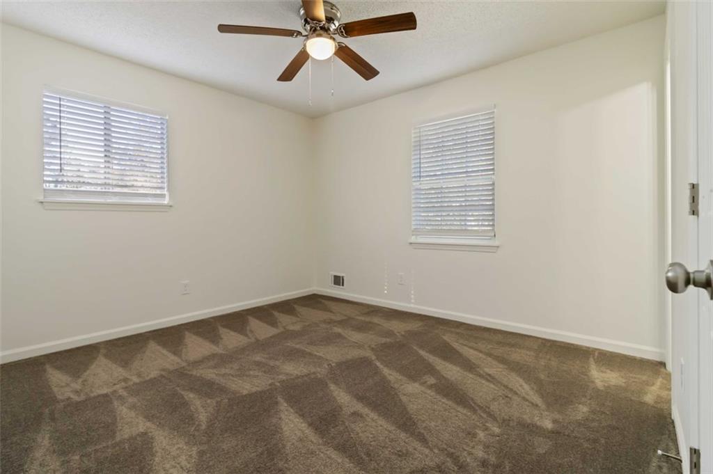 1535 Lake Jodeco Road Jonesboro, GA 30236 - Photo 20 of 45 a view of an empty room with a window