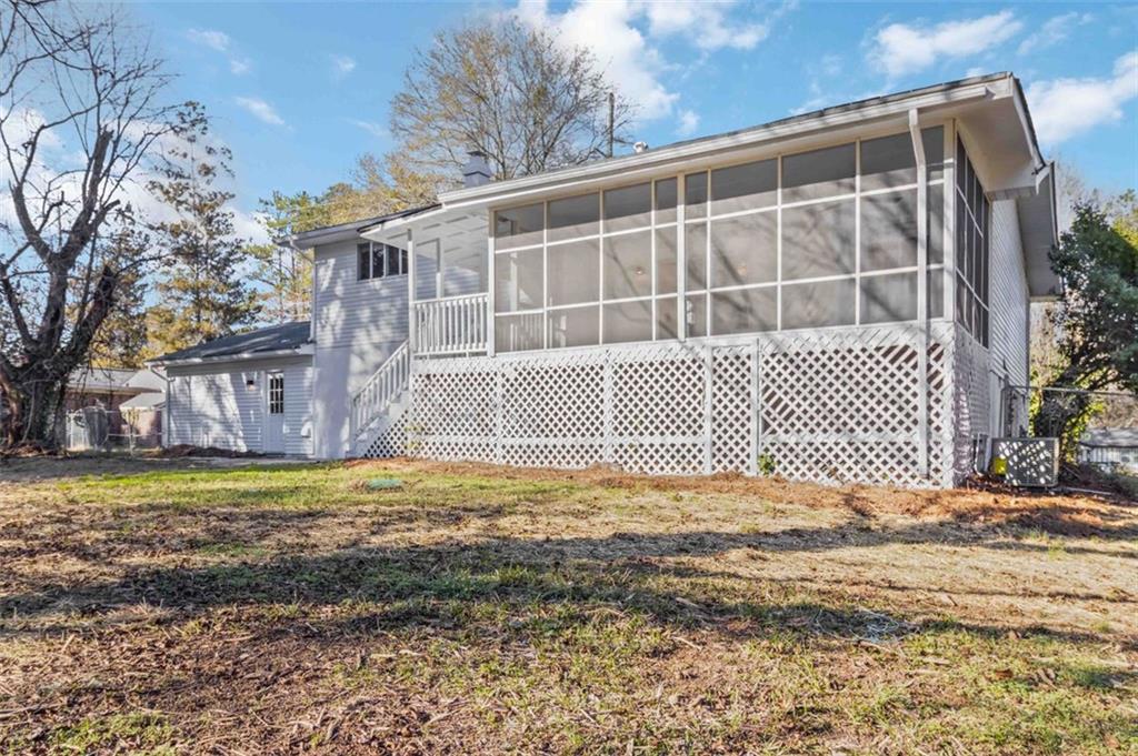 1535 Lake Jodeco Road Jonesboro, GA 30236 - Photo 29 of 45 a front view of a house with a yard