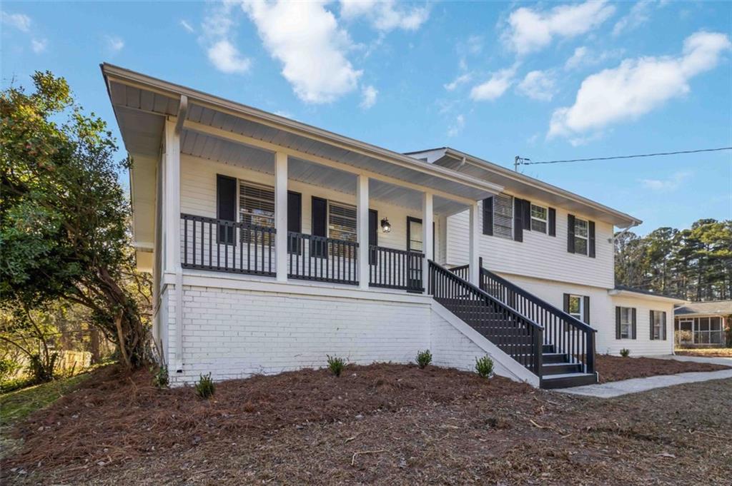 1535 Lake Jodeco Road Jonesboro, GA 30236 - Photo 4 of 45 a view of a house with a yard