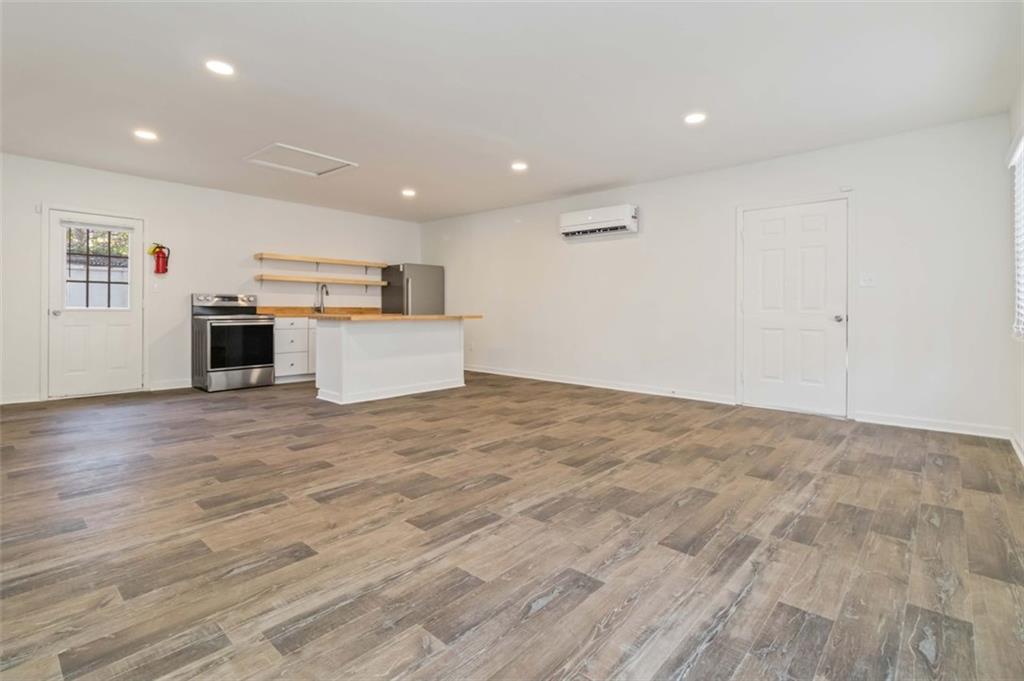 1535 Lake Jodeco Road Jonesboro, GA 30236 - Photo 10 of 45 an empty room with kitchen and window