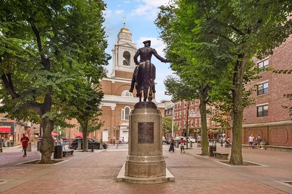 a front view of a building with street view
