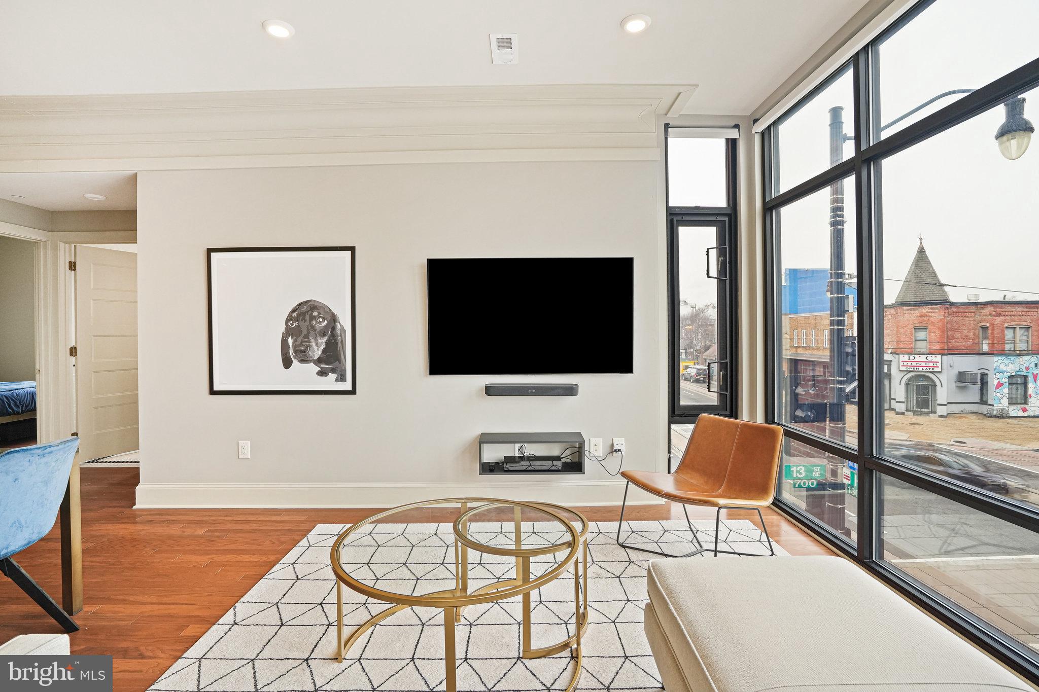 1301 H Street Northeast, Unit 1 Washington, DC 20002 - Photo 11 of 39 Hardwood floors throughout the condo.