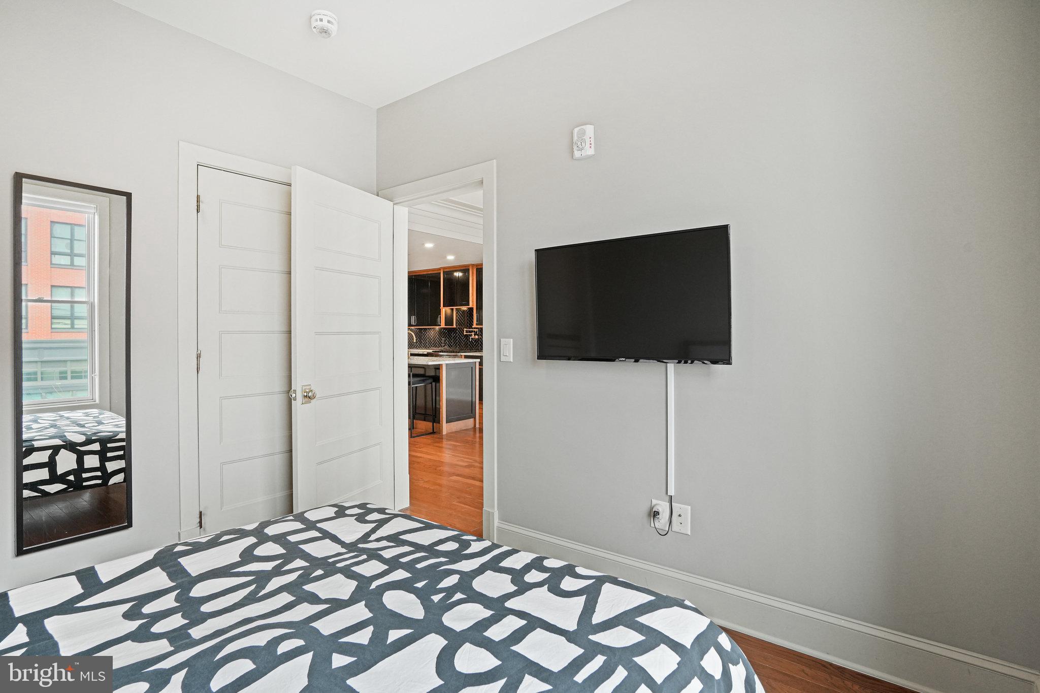 1301 H Street Northeast, Unit 1 Washington, DC 20002 - Photo 14 of 39 A walk-in closet is in the primary bedroom as well