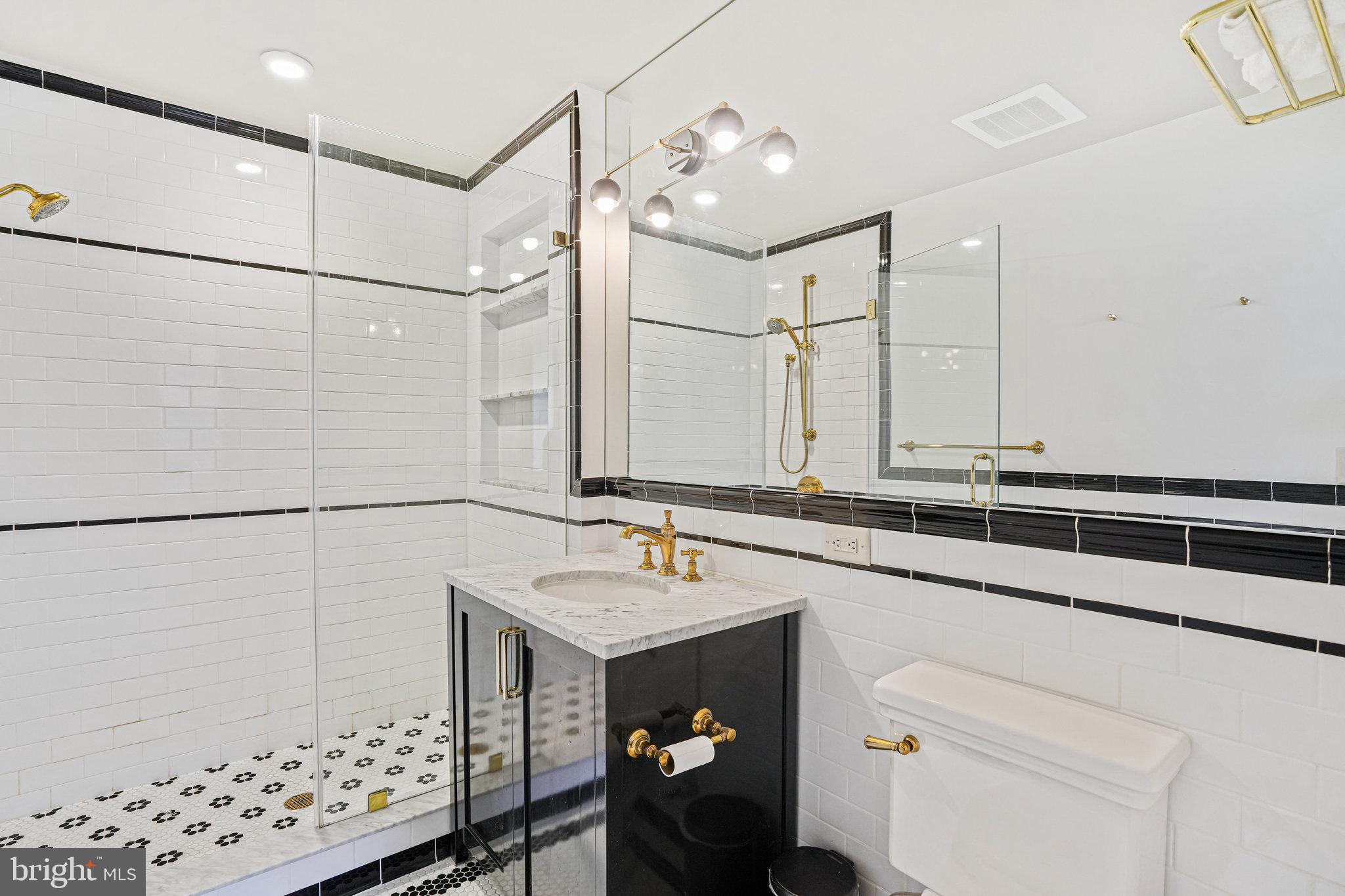 1301 H Street Northeast, Unit 1 Washington, DC 20002 - Photo 15 of 39 Primary bathroom.