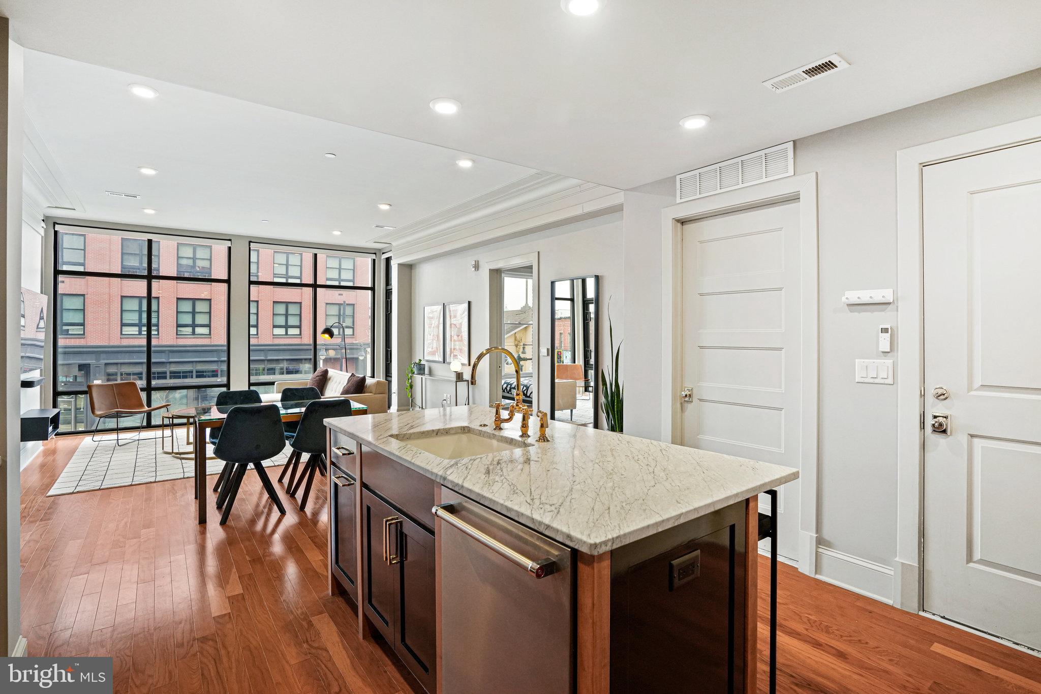 1301 H Street Northeast, Unit 1 Washington, DC 20002 - Photo 38 of 39 Open floor plan with large kitchen island.
