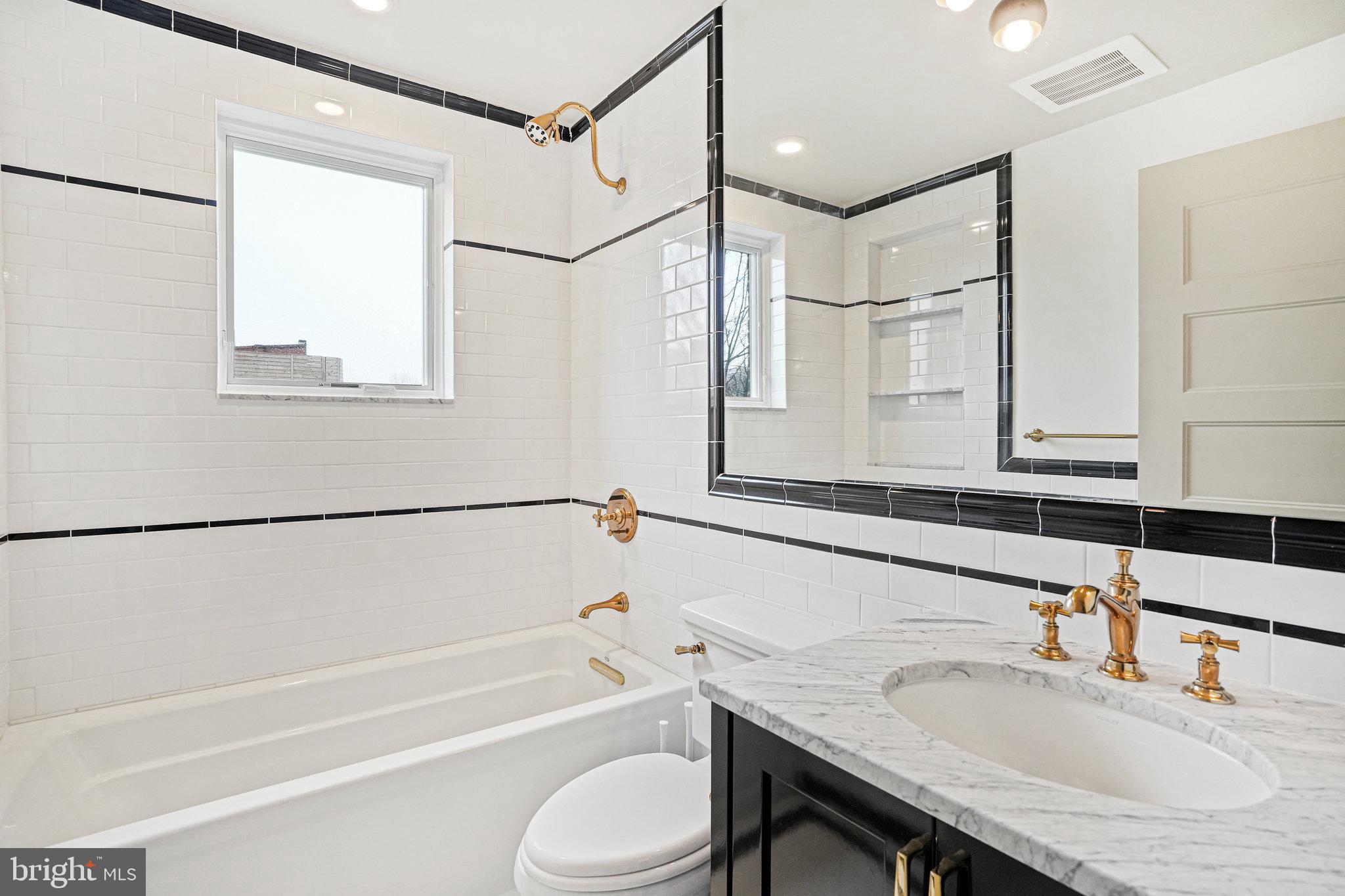 1301 H Street Northeast, Unit 1 Washington, DC 20002 - Photo 20 of 39 2nd full bathroom - located in the hallway.