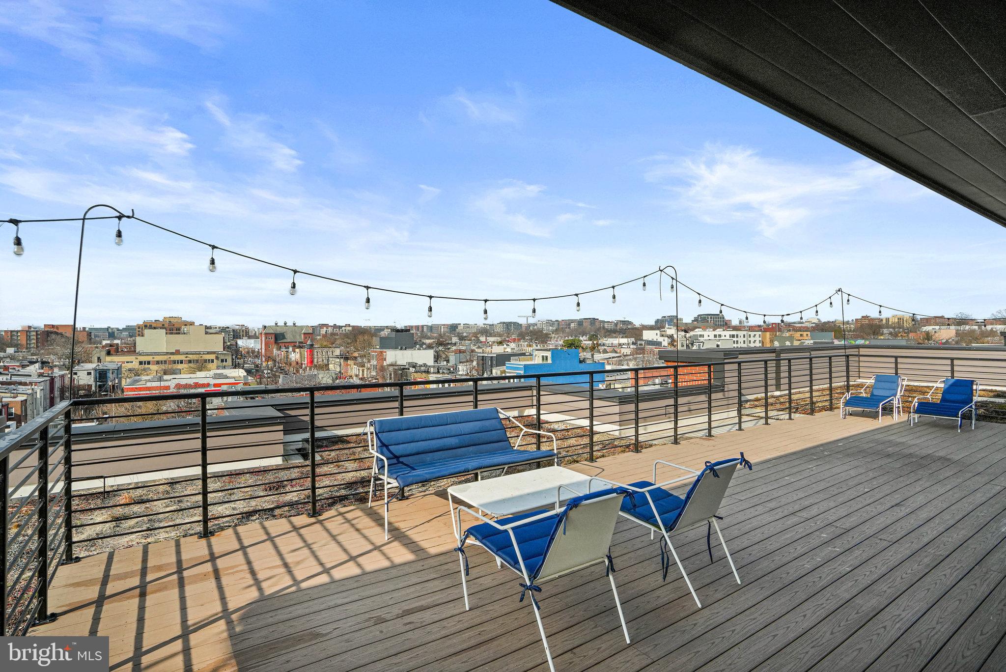 1301 H Street Northeast, Unit 1 Washington, DC 20002 - Photo 28 of 39 Relax with friends and family on the rooftop deck.