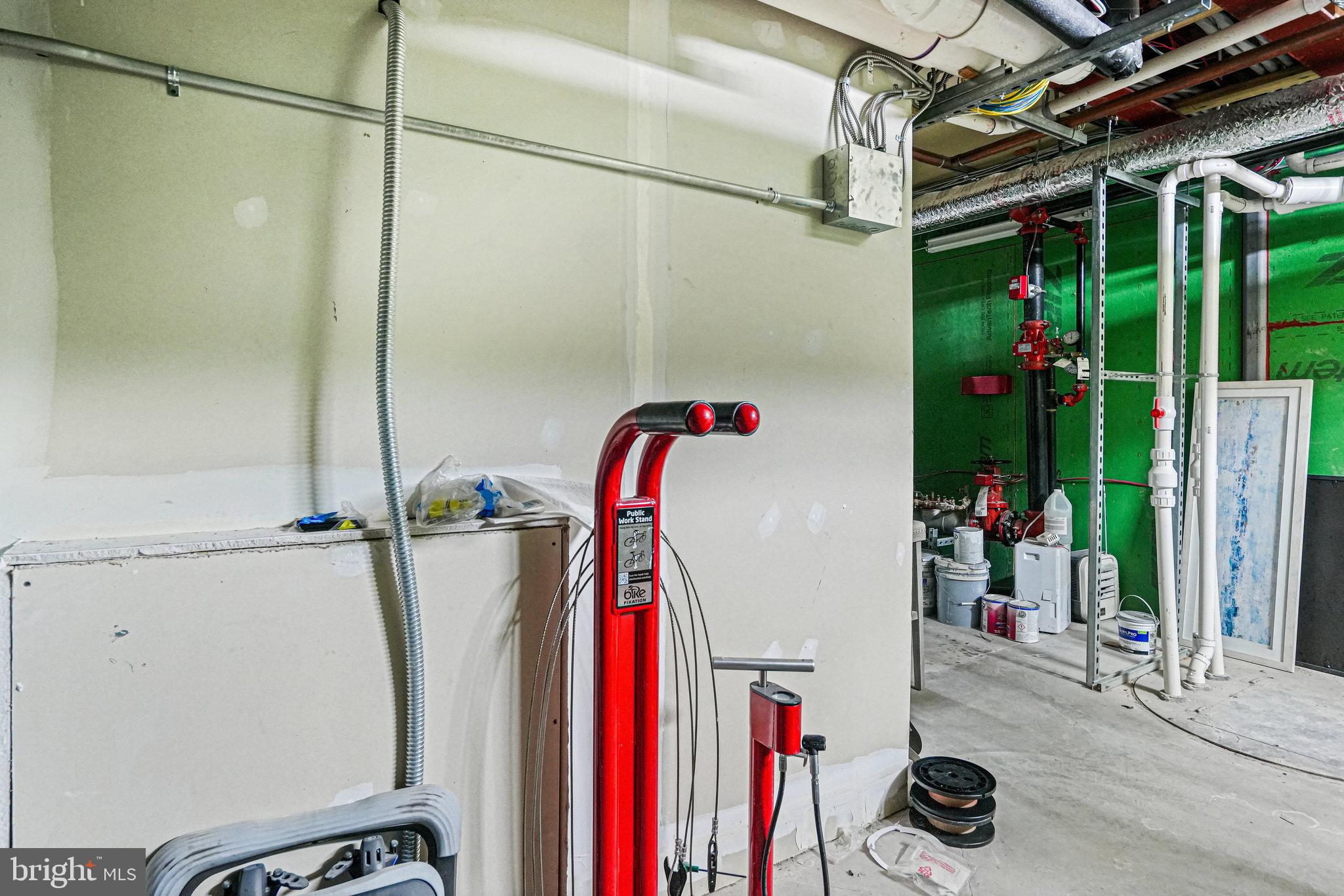 1301 H Street Northeast, Unit 1 Washington, DC 20002 - Photo 32 of 39 Repair station in the secure bike room.