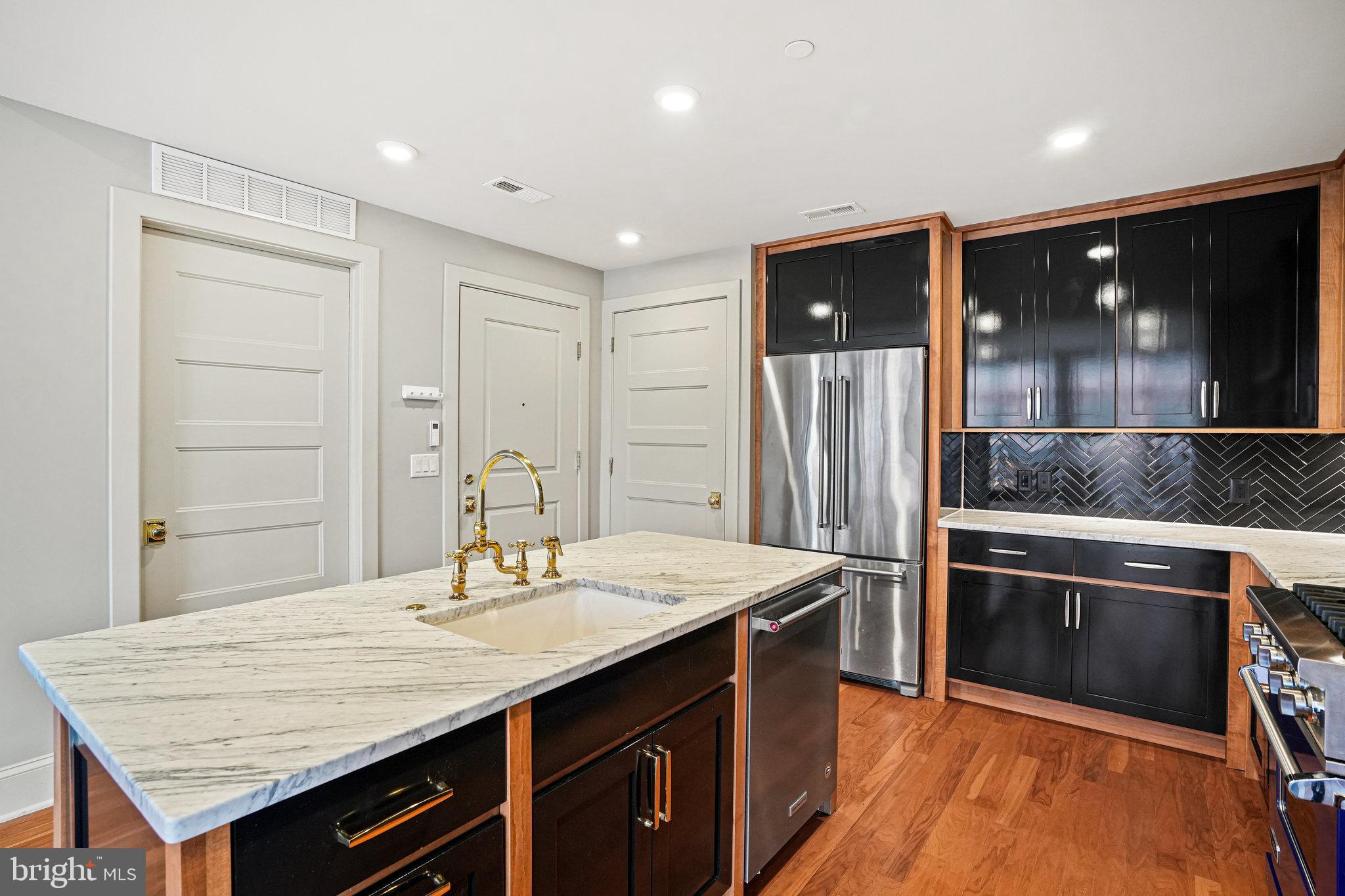 1301 H Street Northeast, Unit 1 Washington, DC 20002 - Photo 4 of 39 Kitchen-Aid Energy Star stainless steel appliances