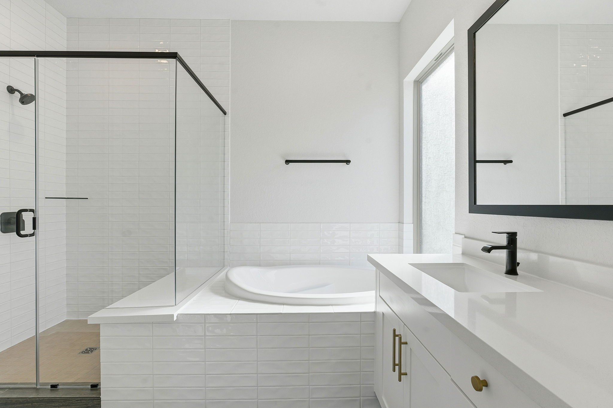 276 Prickly Poppy Loop Kyle, TX 78640 - Photo 10 of 38 Full bath with vanity, a stall shower, and a bath