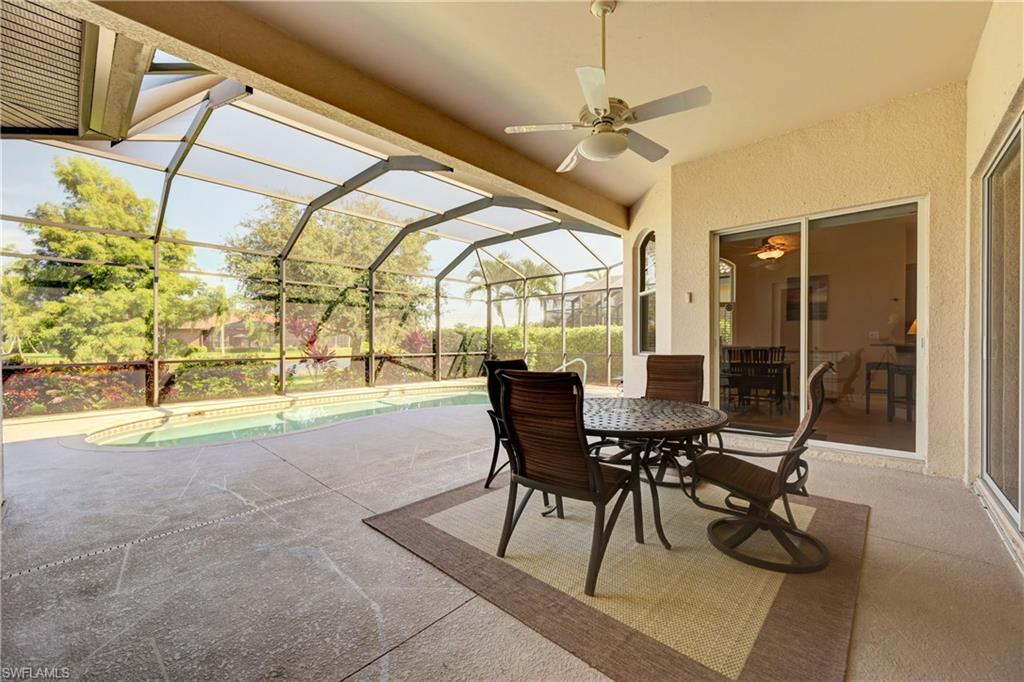 12518 Grandezza Circle Estero, FL 33928 - Photo 12 of 33 a view of a dining room with furniture window and outside view
