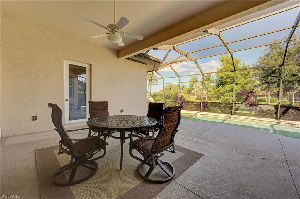 12518 Grandezza Circle Estero, FL 33928 - Photo 13 of 33 a view of a dining room with furniture window and outside view