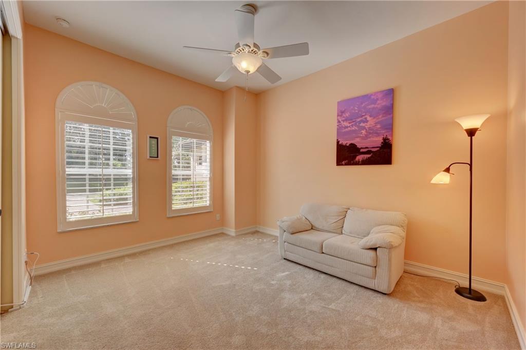 12518 Grandezza Circle Estero, FL 33928 - Photo 25 of 33 a living room with furniture and a window