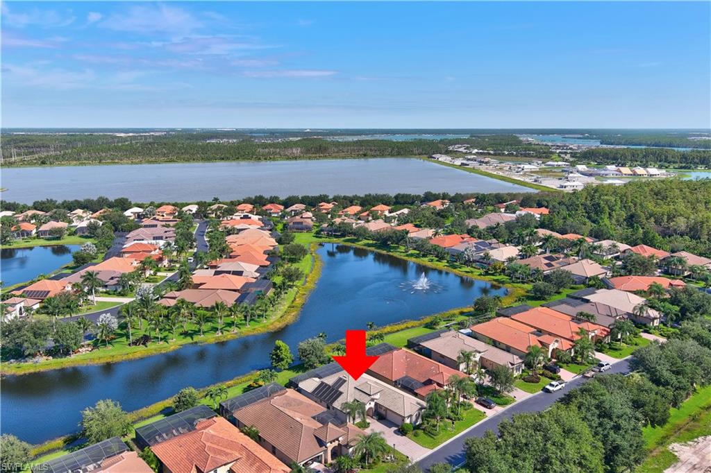 12518 Grandezza Circle Estero, FL 33928 - Photo 33 of 33 an aerial view of a city and lake view