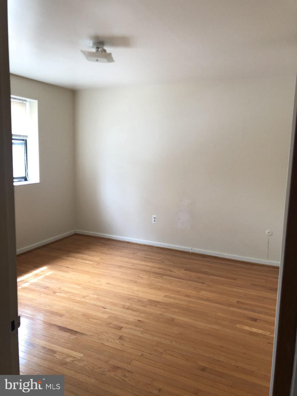 730 South 10th Street Philadelphia, PA 19147 - Photo 6 of 8 a view of an empty room and window