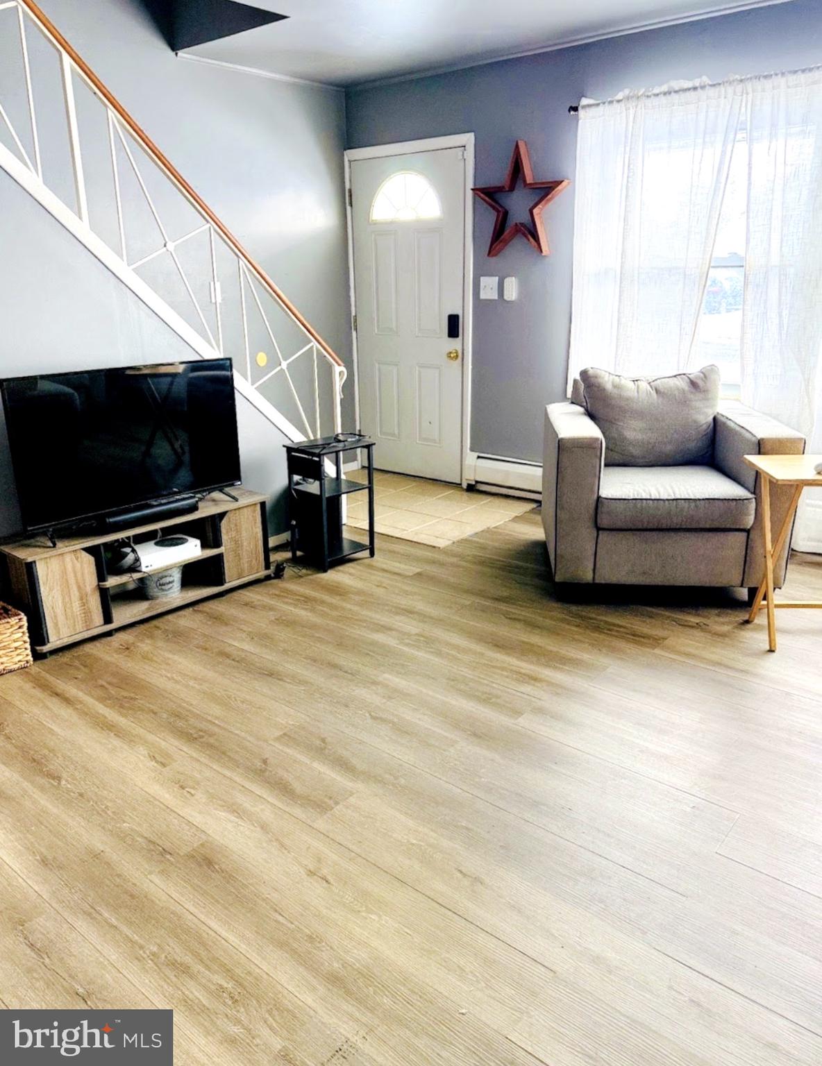 30 Misty Pine Road Levittown, PA 19056 - Photo 3 of 21 a living room with furniture and a flat screen tv