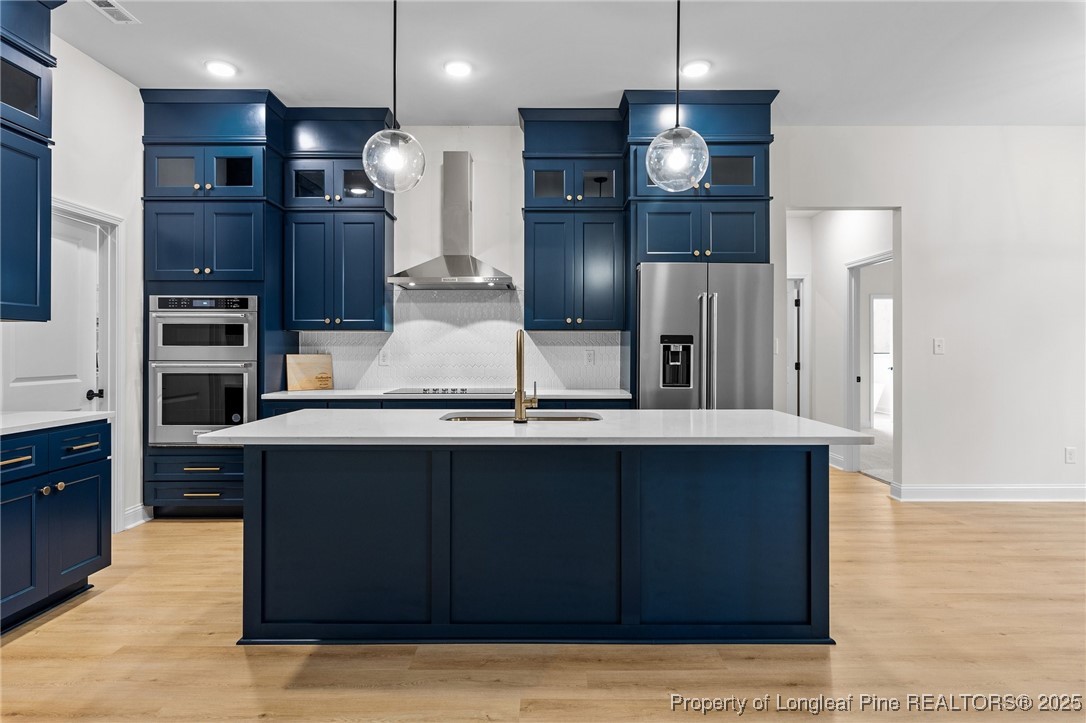 Tbd Doe Hill Road Autryville, NC 28318 - Photo 13 of 44 a kitchen with stainless steel appliances kitchen island granite countertop a refrigerator and a sink