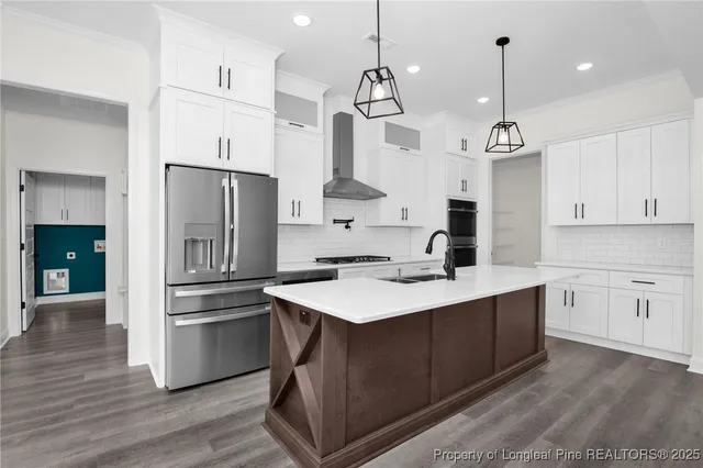 an empty room with a window and a ceiling fan