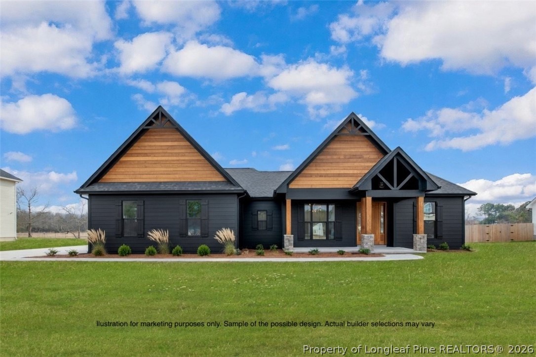 Tbd Doe Hill Road Autryville, NC 28318 - Photo 2 of 47 a front view of a house with garden