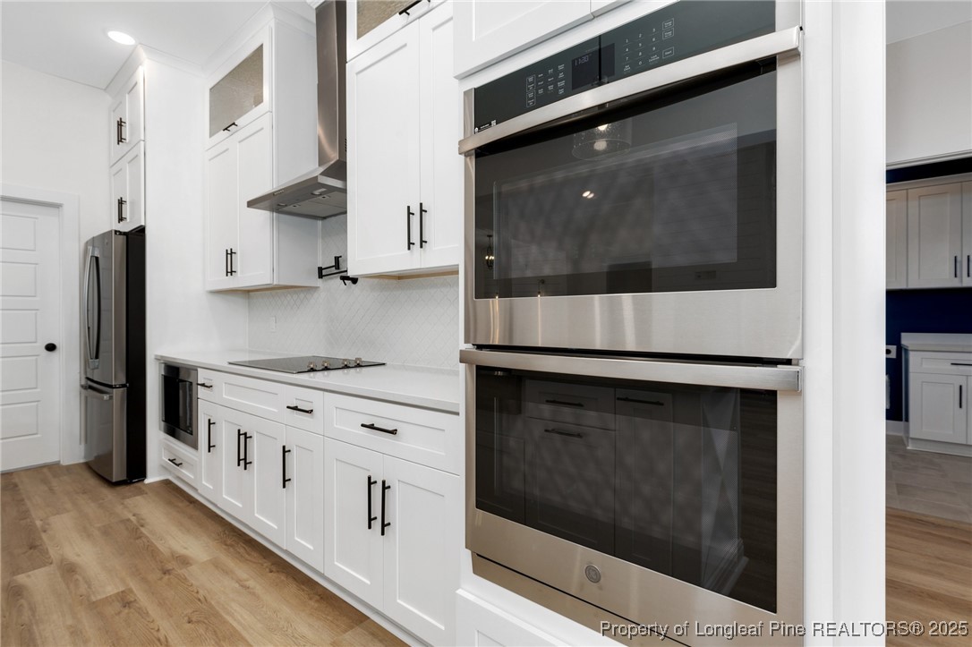 Tbd Doe Hill Road Autryville, NC 28318 - Photo 22 of 47 a kitchen with stainless steel appliances kitchen island granite countertop a stove and a microwave