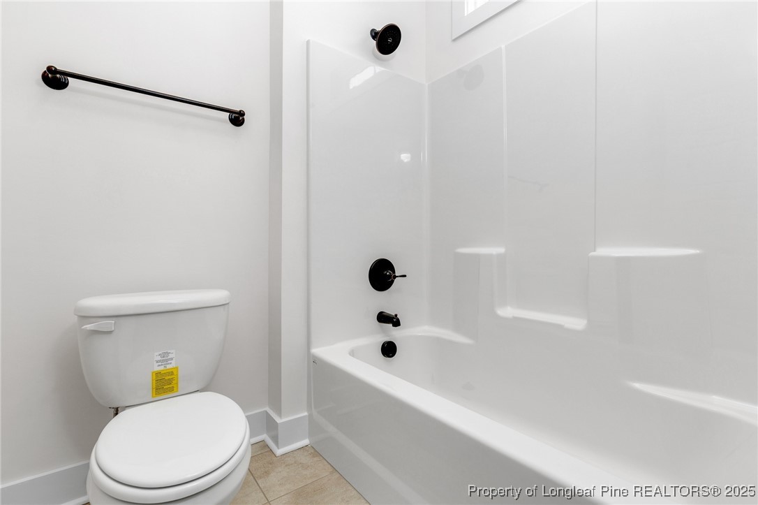 Tbd Doe Hill Road Autryville, NC 28318 - Photo 36 of 44 a white toilet sitting next to a bath tub