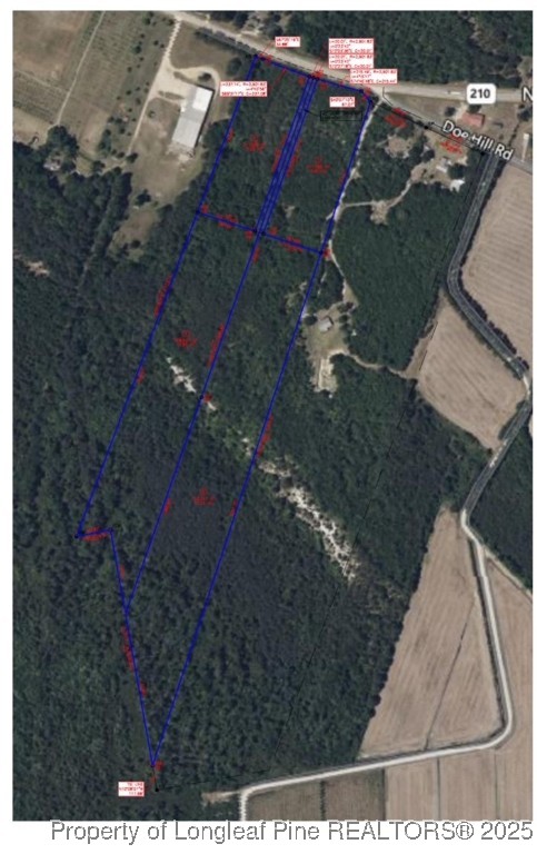Tbd Doe Hill Road Autryville, NC 28318 - Photo 44 of 44 an aerial view of residential houses with outdoor space
