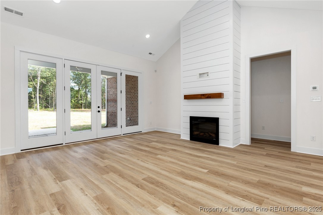 Tbd Doe Hill Road Autryville, NC 28318 - Photo 10 of 44 a view of an empty room with a window and fireplace