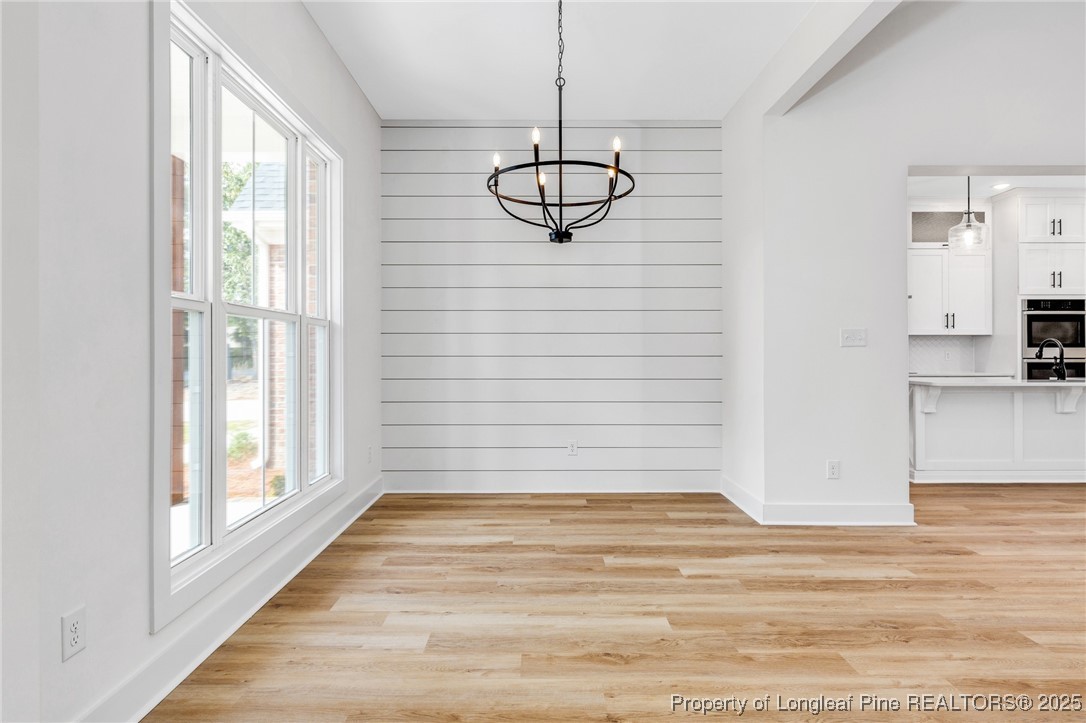 Tbd Doe Hill Road Autryville, NC 28318 - Photo 10 of 47 a view of an empty room with wooden floor and a window