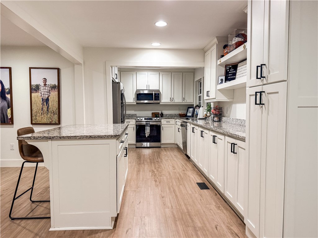 757 Belle Shoals Road Pickens, SC 29671 - Photo 22 of 31 Culinary creations come to life in this kitchen, featuring ample counter space and modern appliances.