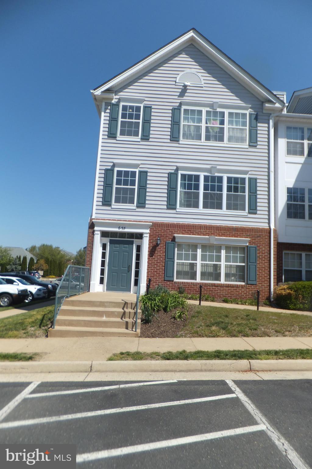 655 Constellation Square Southeast, Unit B Leesburg, VA 20175 - Photo 1 of 13 a front view of a house
