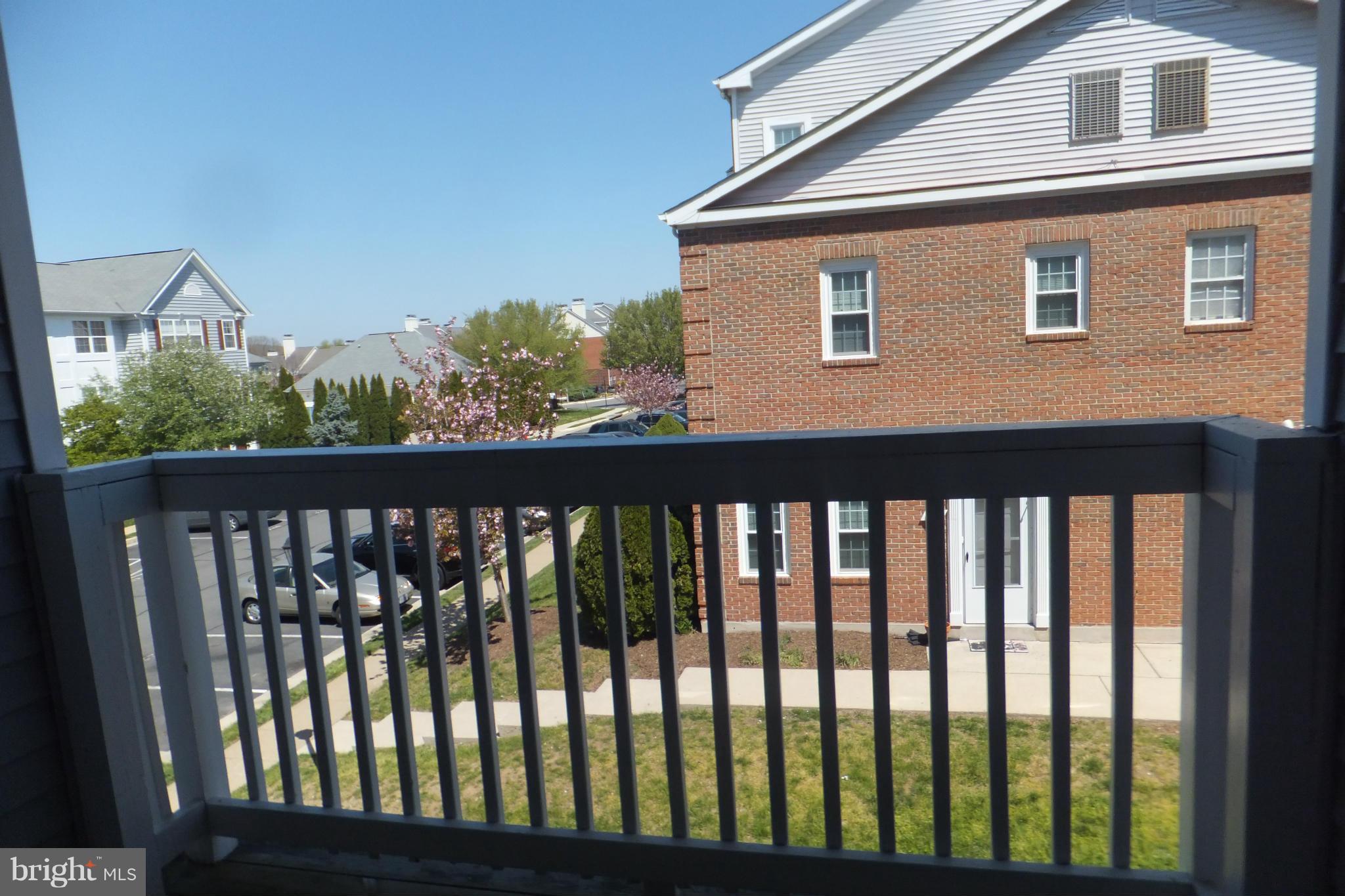 655 Constellation Square Southeast, Unit B Leesburg, VA 20175 - Photo 13 of 13 a balcony view with an outdoor space