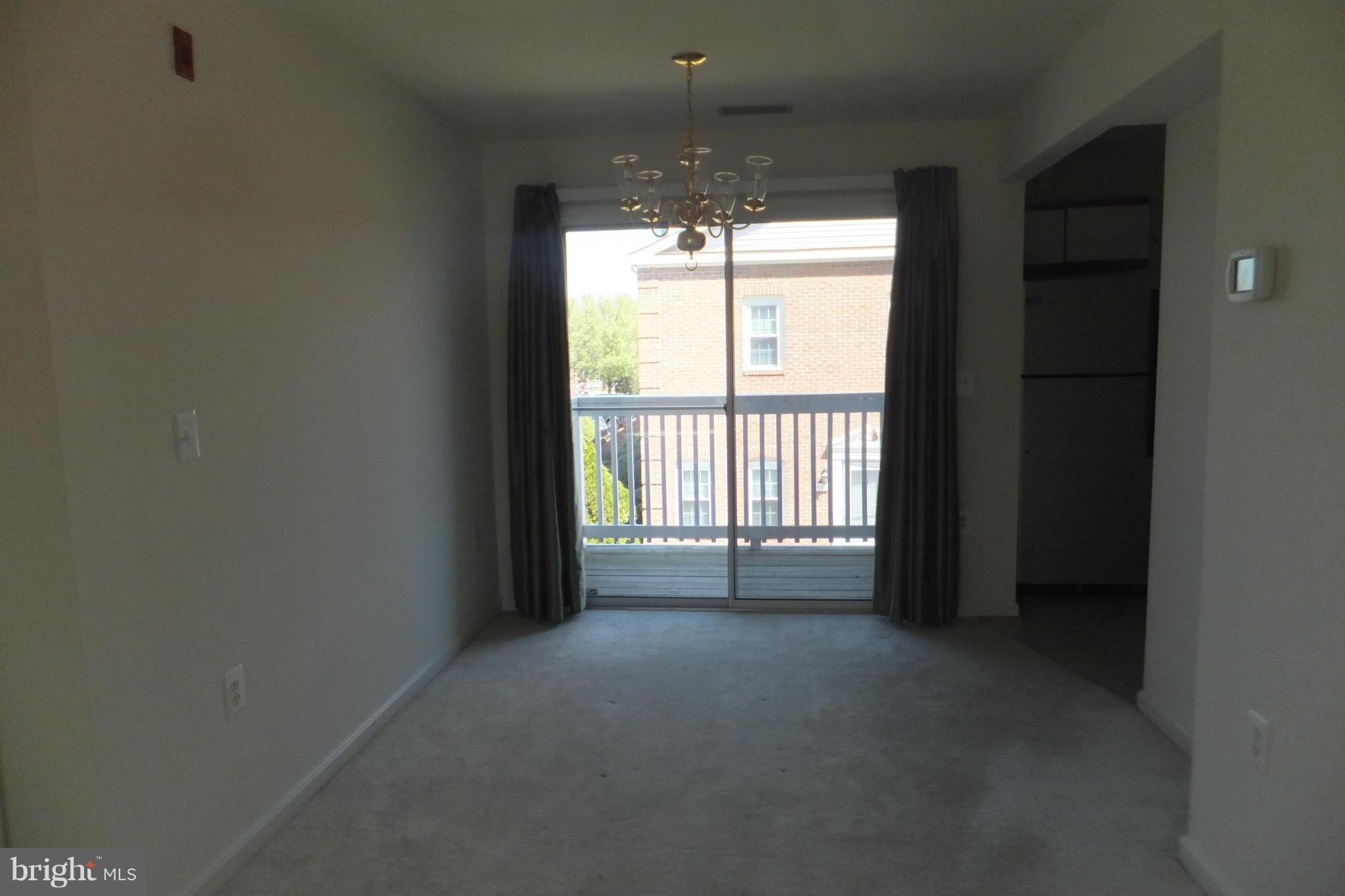 655 Constellation Square Southeast, Unit B Leesburg, VA 20175 - Photo 7 of 13 a view of room and window