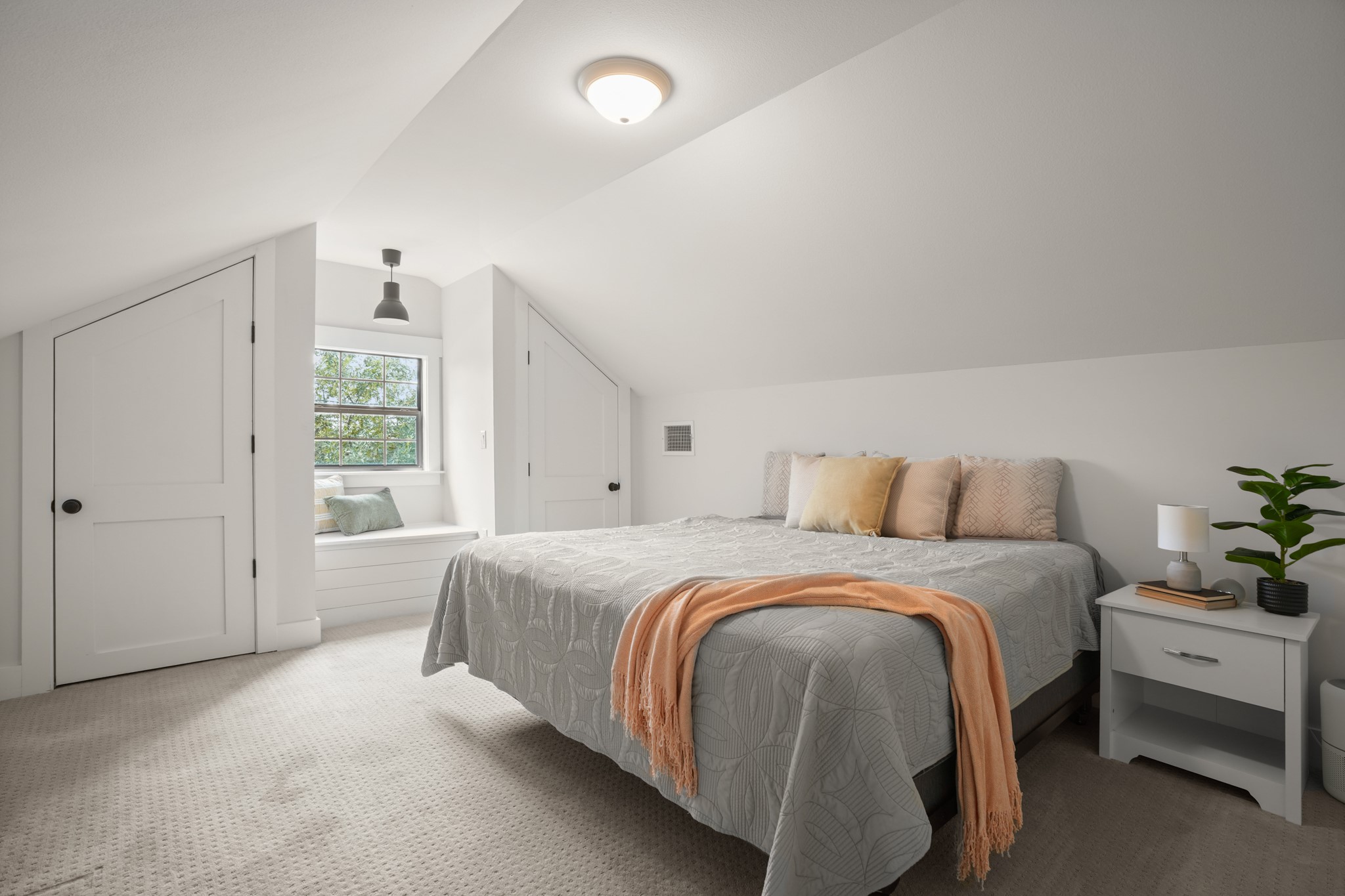 301 Old Thorndale Road Taylor, TX 76574 - Photo 14 of 29 Sloping ceilings create an inviting, private haven in this cozy upper-level bedroom.