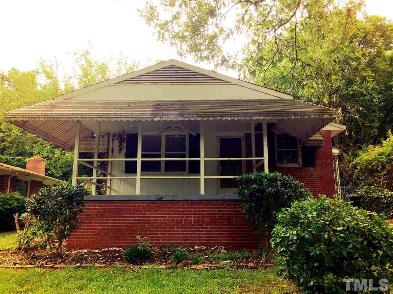 604 Latta Street Raleigh, NC 27607 - Photo 1 of 7 a front view of a house with garden