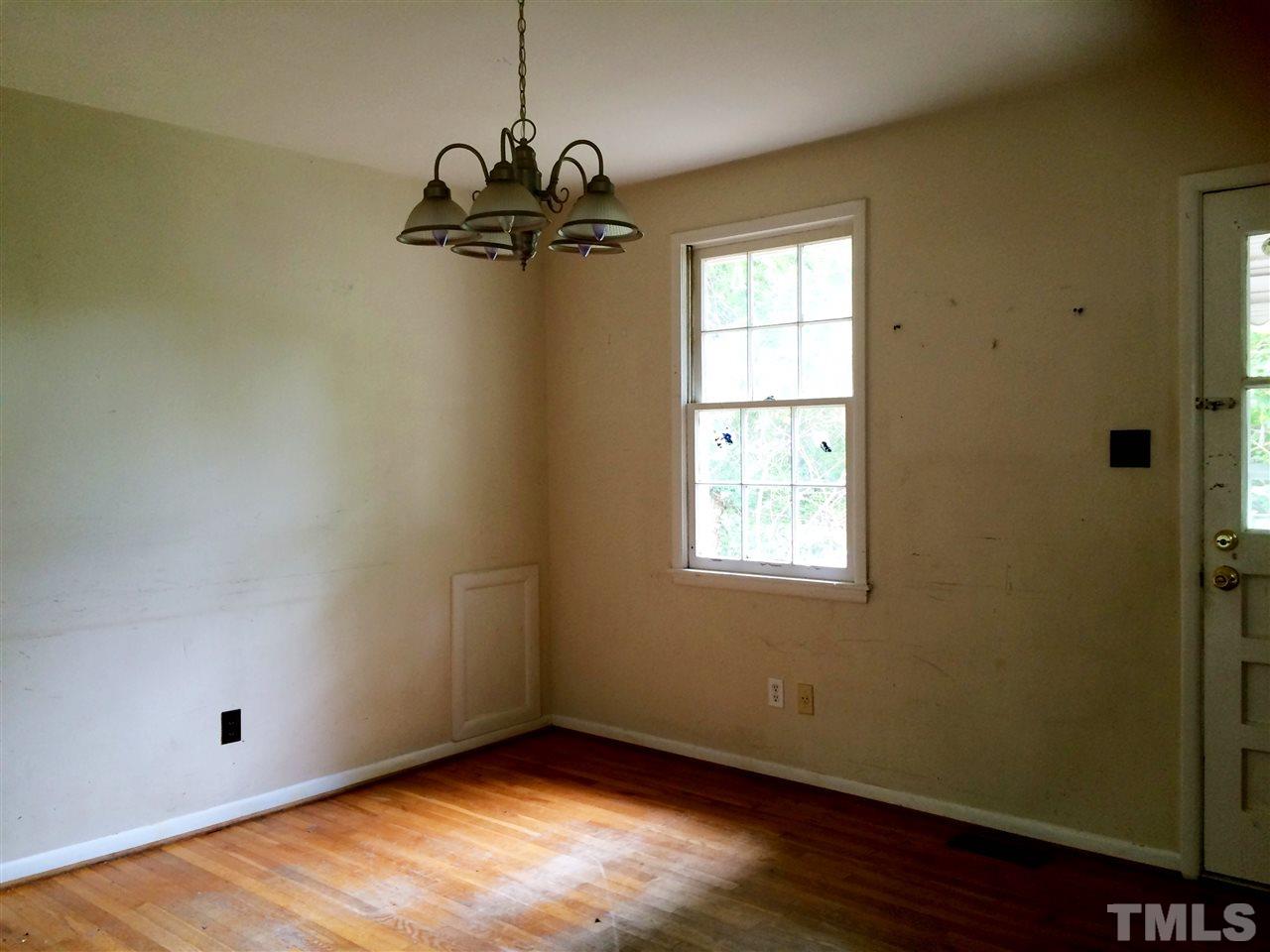 604 Latta Street Raleigh, NC 27607 - Photo 5 of 7 a view of an empty room with a window