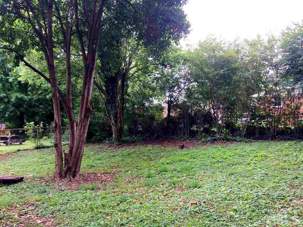 604 Latta Street Raleigh, NC 27607 - Photo 7 of 7 a view of a backyard with large trees