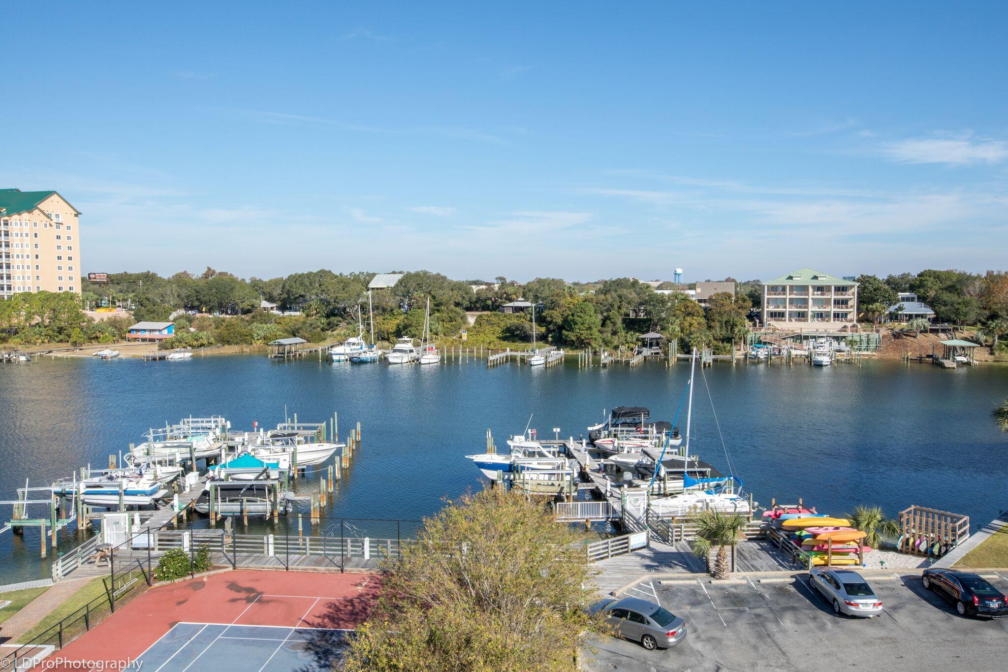 30 Moreno Point Road, Unit 601A Destin, FL 32541 - Photo 1 of 32 a view of a lake with outdoor seating space