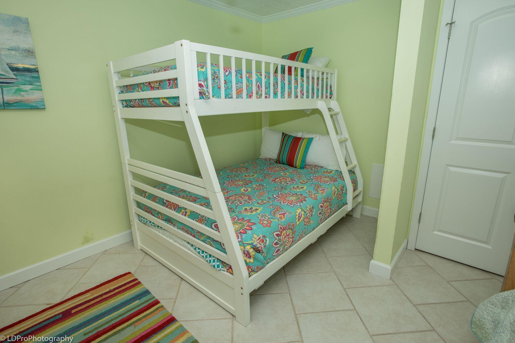 30 Moreno Point Road, Unit 601A Destin, FL 32541 - Photo 24 of 32 a bedroom with a bed and a window