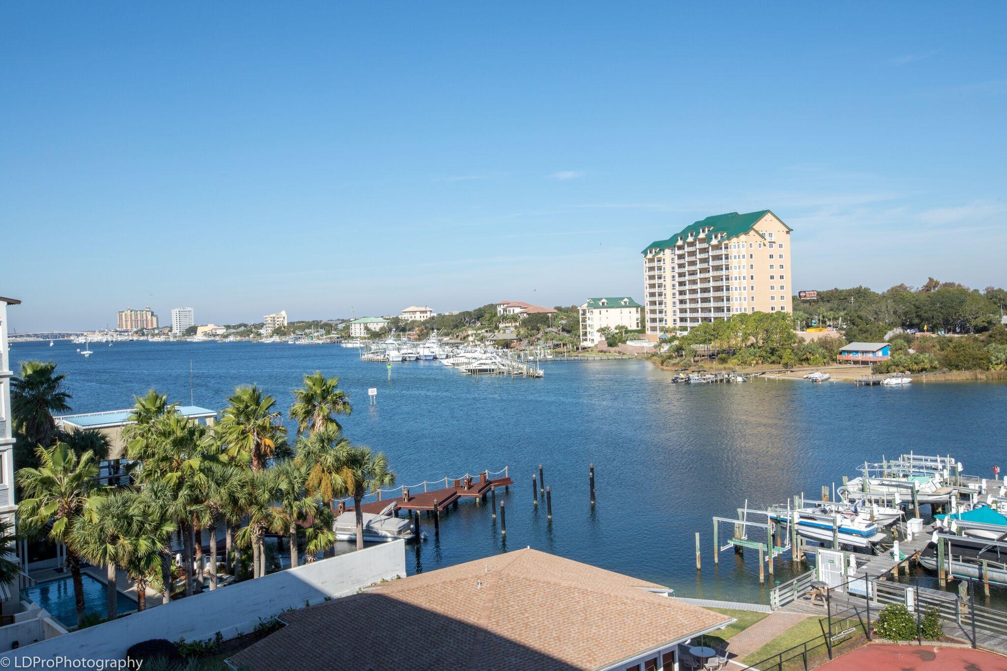 30 Moreno Point Road, Unit 601A Destin, FL 32541 - Photo 4 of 32 a view of a terrace with chairs