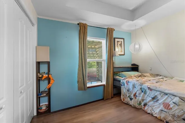 a backyard of a house with barbeque oven and outdoor seating