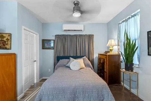 a kitchen with a refrigerator and microwave