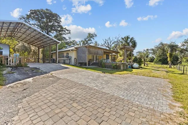a view of a house with swimming pool