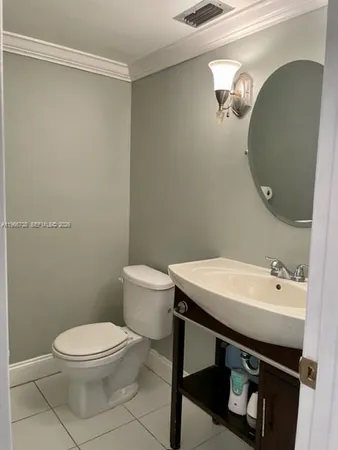 a view of a swimming pool with a yard