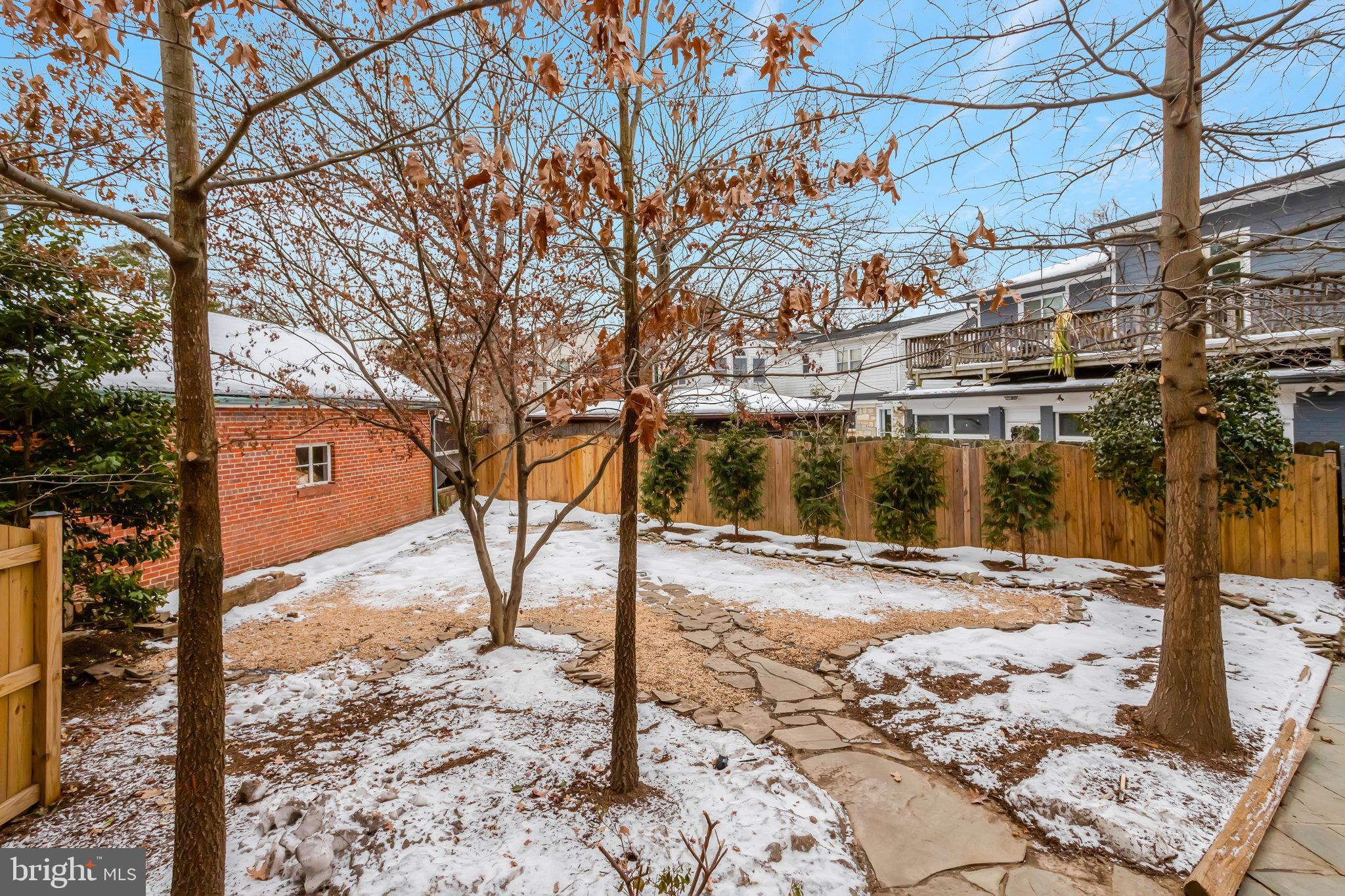 826 West Braddock Road Alexandria, VA 22302 - Photo 22 of 56 a view of a yard covered in snow