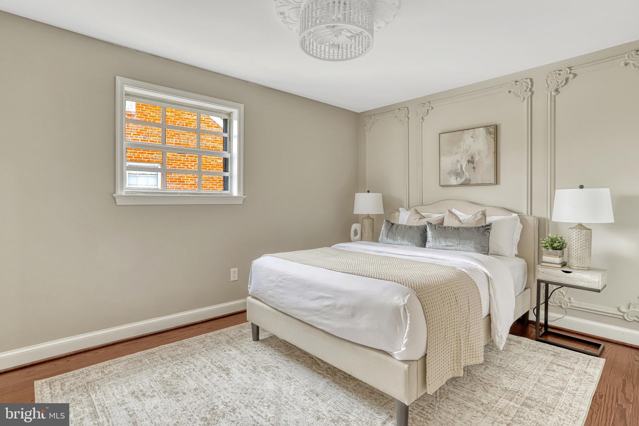 826 West Braddock Road Alexandria, VA 22302 - Photo 41 of 56 a bedroom with a bed and a window