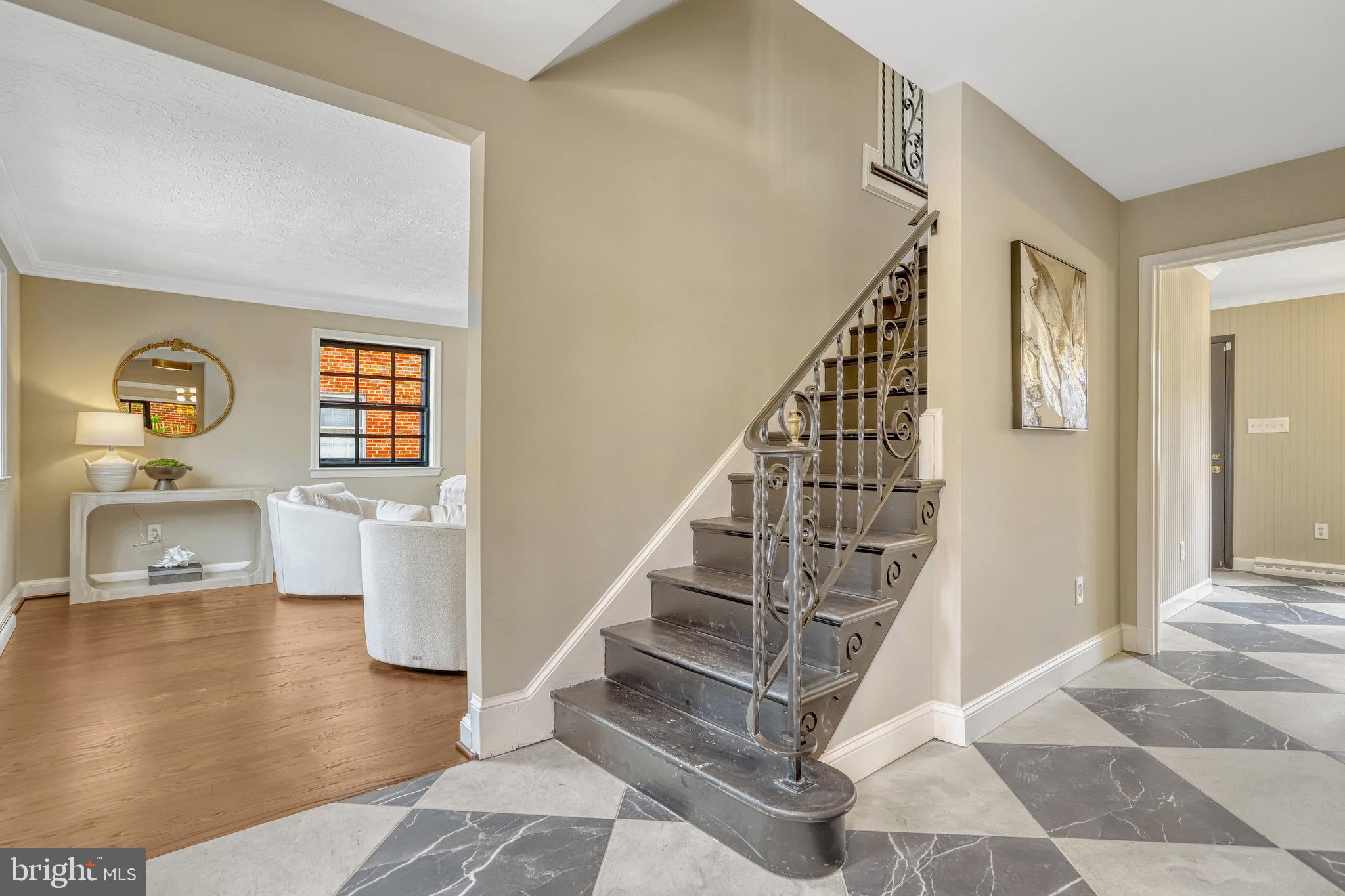 826 West Braddock Road Alexandria, VA 22302 - Photo 4 of 56 a view of entryway and hall with wooden floor