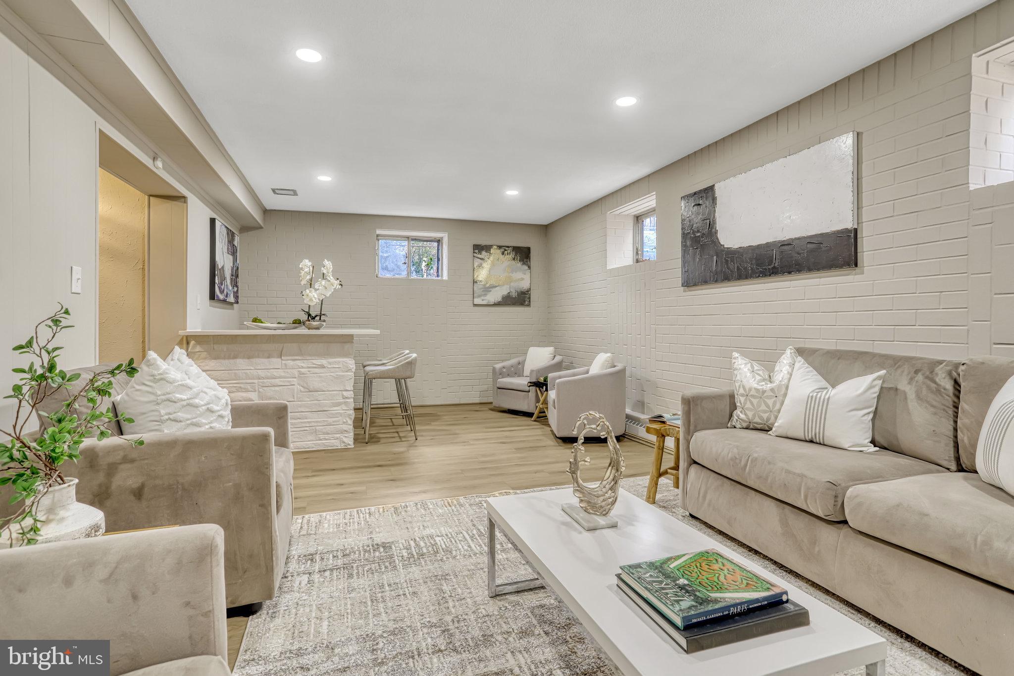826 West Braddock Road Alexandria, VA 22302 - Photo 51 of 56 a living room with furniture and a couch